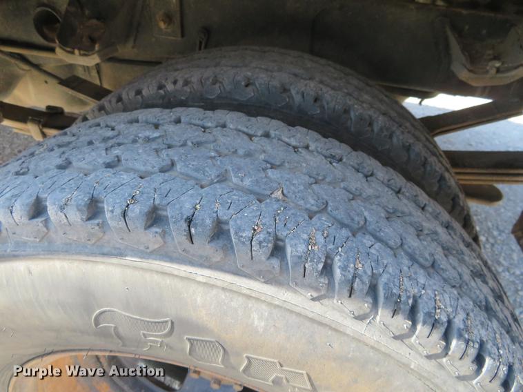 image for item DF9877 2007 Dodge Ram 3500 Quad Cab flatbed pickup truck