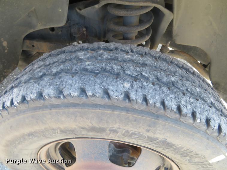 image for item DF9877 2007 Dodge Ram 3500 Quad Cab flatbed pickup truck