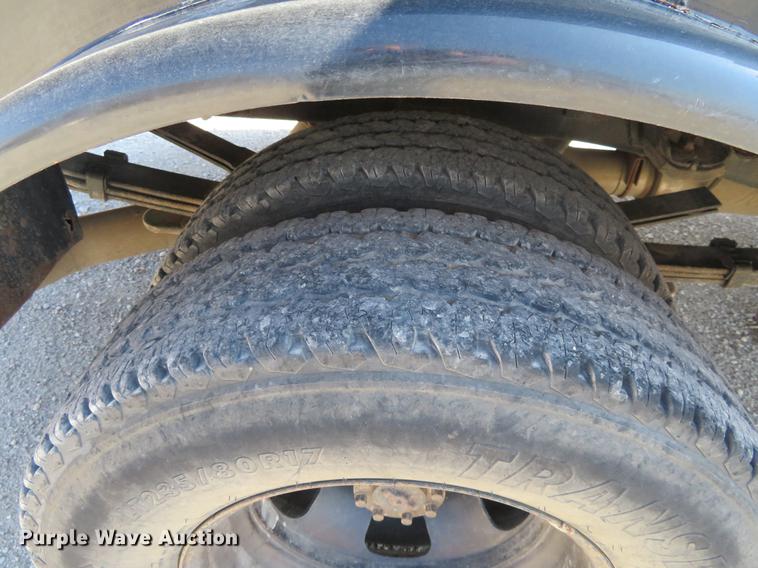 image for item DF9877 2007 Dodge Ram 3500 Quad Cab flatbed pickup truck