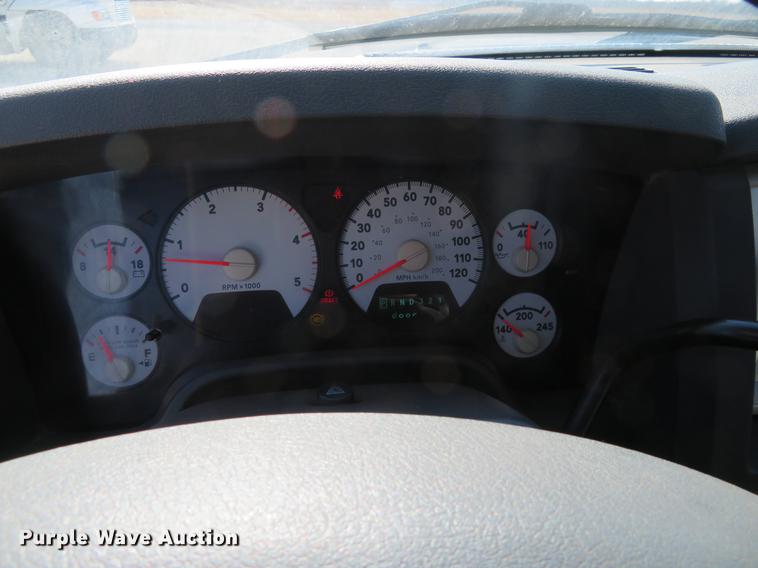 image for item DF9878 2008 Dodge Ram 3500 Quad Cab flatbed pickup truck