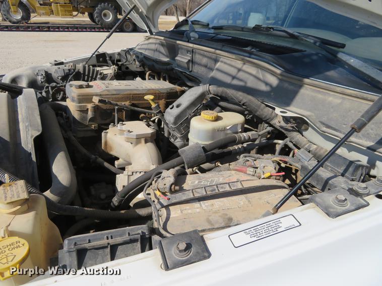 image for item DF9878 2008 Dodge Ram 3500 Quad Cab flatbed pickup truck