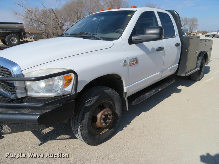image for item DF9878 2008 Dodge Ram 3500 Quad Cab flatbed pickup truck