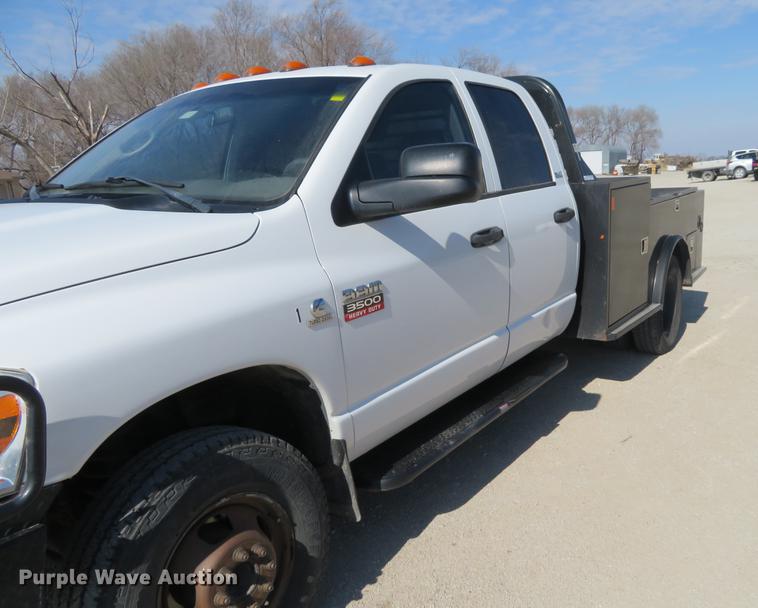 image for item DF9878 2008 Dodge Ram 3500 Quad Cab flatbed pickup truck