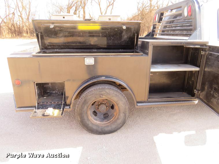 image for item DF9878 2008 Dodge Ram 3500 Quad Cab flatbed pickup truck