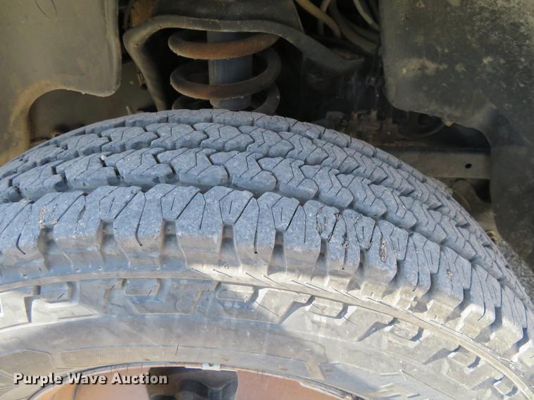 image for item DF9878 2008 Dodge Ram 3500 Quad Cab flatbed pickup truck