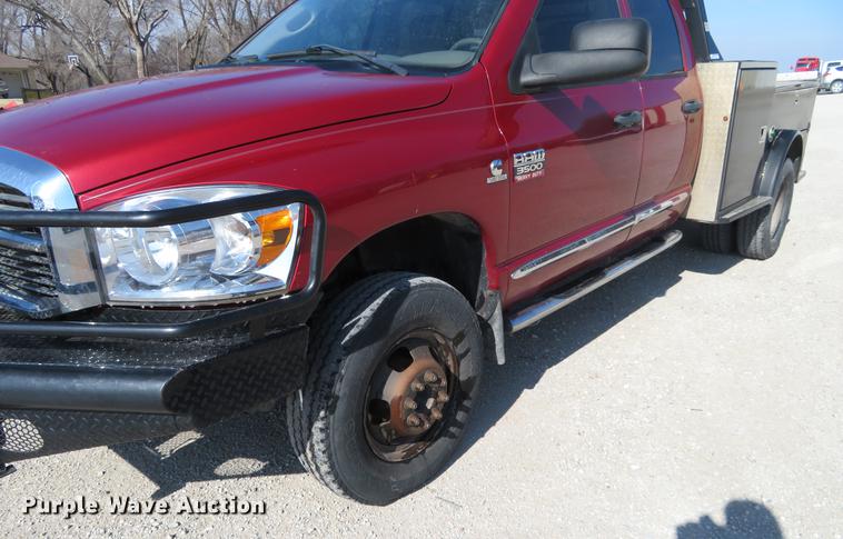 image for item DF9879 2008 Dodge Ram 3500 Quad Cab flatbed pickup truck