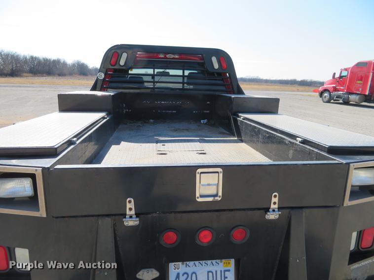 image for item DF9879 2008 Dodge Ram 3500 Quad Cab flatbed pickup truck