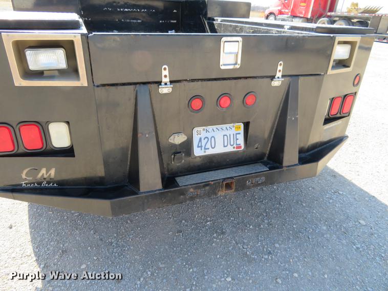 image for item DF9879 2008 Dodge Ram 3500 Quad Cab flatbed pickup truck