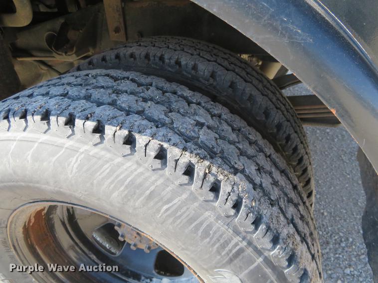 image for item DF9879 2008 Dodge Ram 3500 Quad Cab flatbed pickup truck