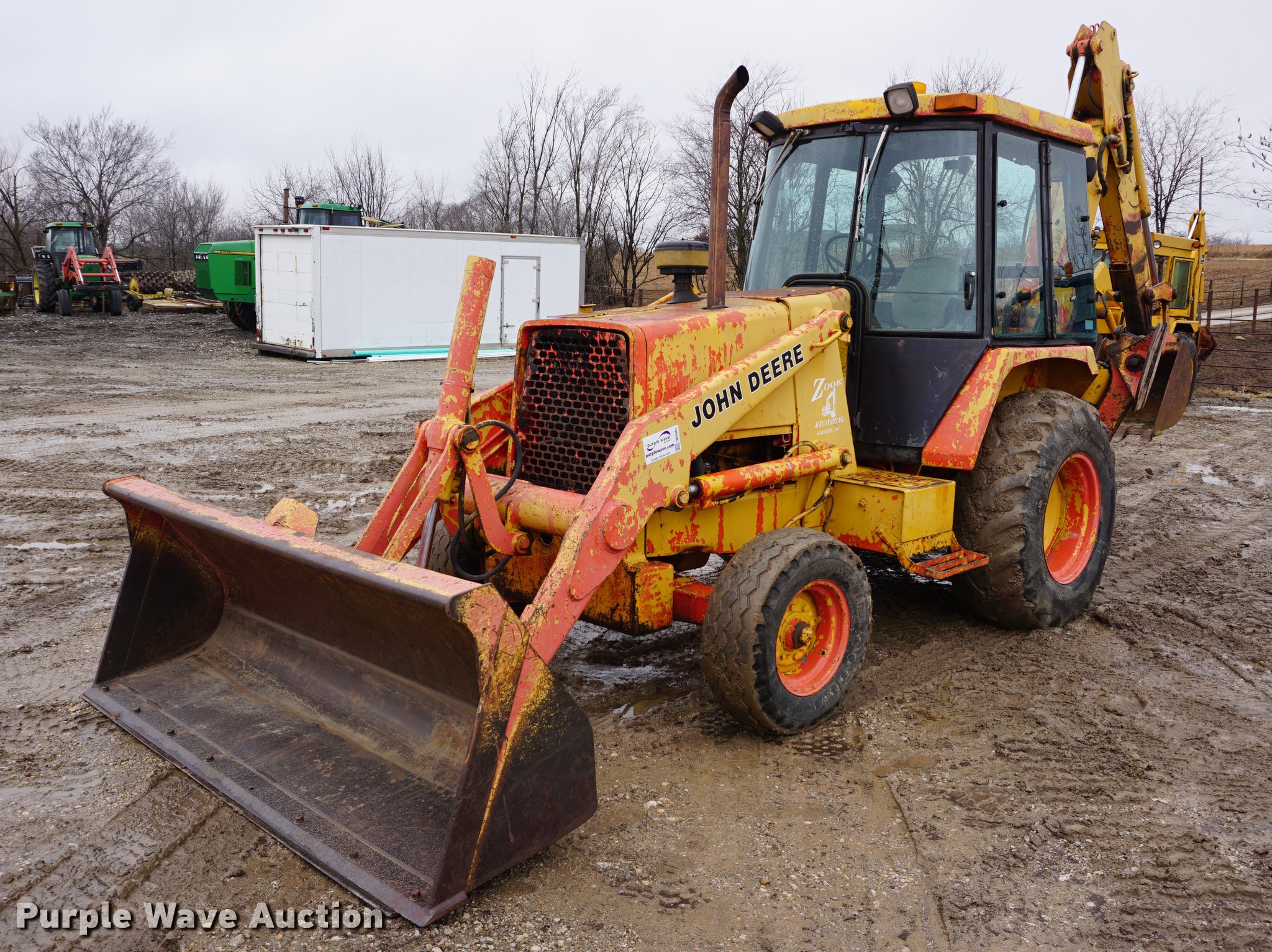 1990 John Deere 310C backhoe in KS Item DB0461 sold Purple