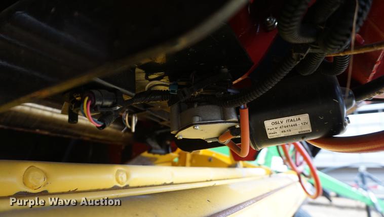 image for item DB0465 2014 New Holland Rollbelt 560 specialty crop round baler