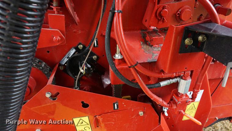 image for item DB0465 2014 New Holland Rollbelt 560 specialty crop round baler