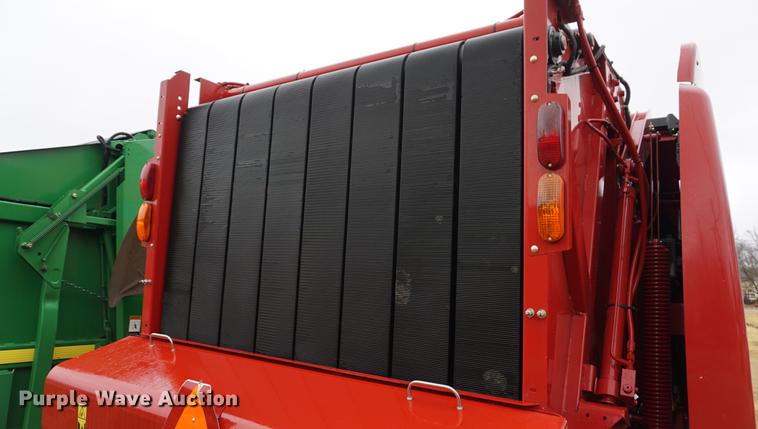 image for item DB0465 2014 New Holland Rollbelt 560 specialty crop round baler