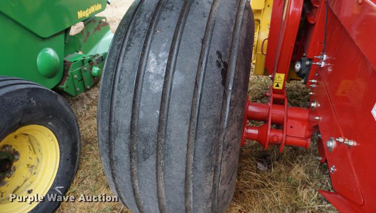 image for item DB0465 2014 New Holland Rollbelt 560 specialty crop round baler