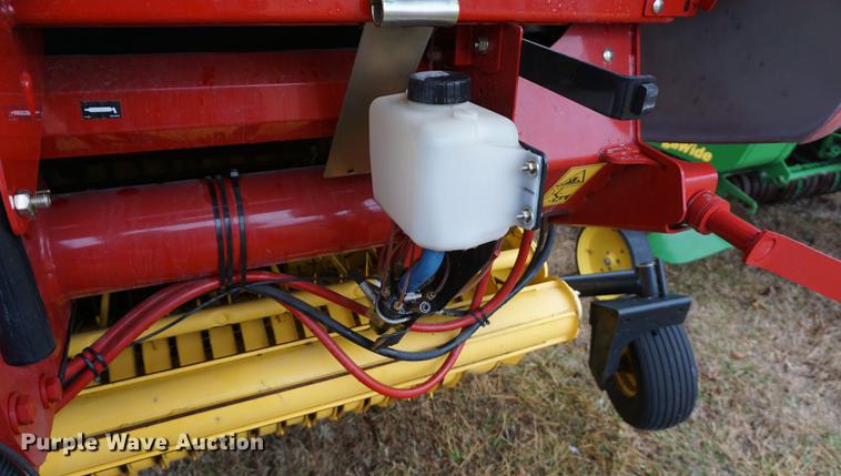 image for item DB0465 2014 New Holland Rollbelt 560 specialty crop round baler