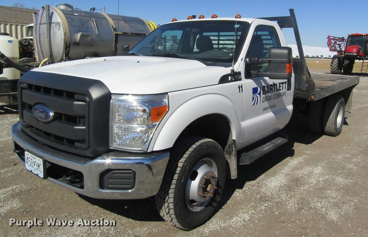 image for item DB5968 2013 Ford F350 Super Duty flatbed pickup truck