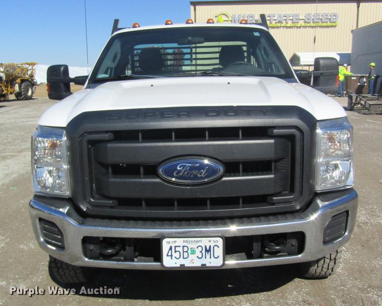 image for item DB5968 2013 Ford F350 Super Duty flatbed pickup truck