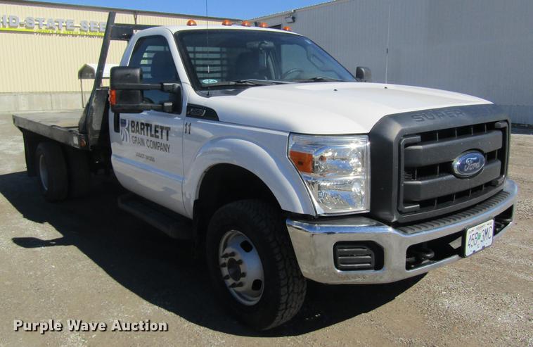 image for item DB5968 2013 Ford F350 Super Duty flatbed pickup truck