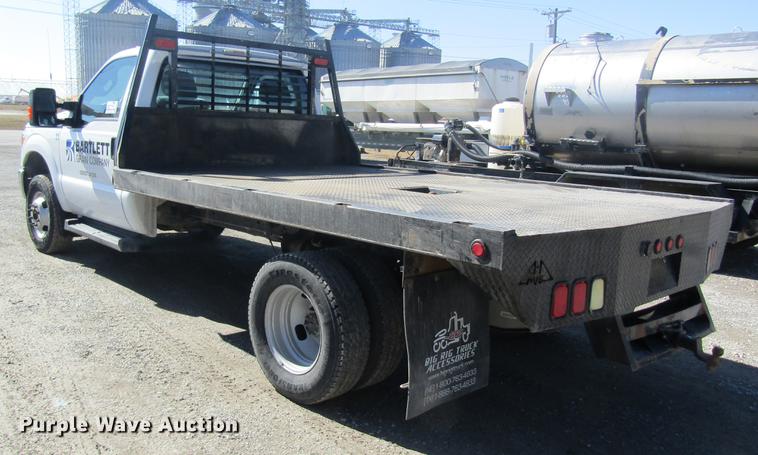 image for item DB5968 2013 Ford F350 Super Duty flatbed pickup truck