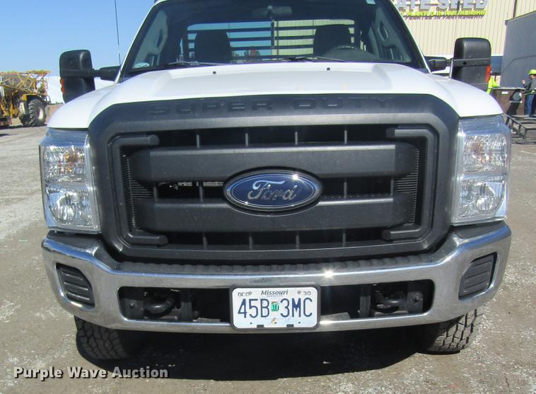 image for item DB5968 2013 Ford F350 Super Duty flatbed pickup truck