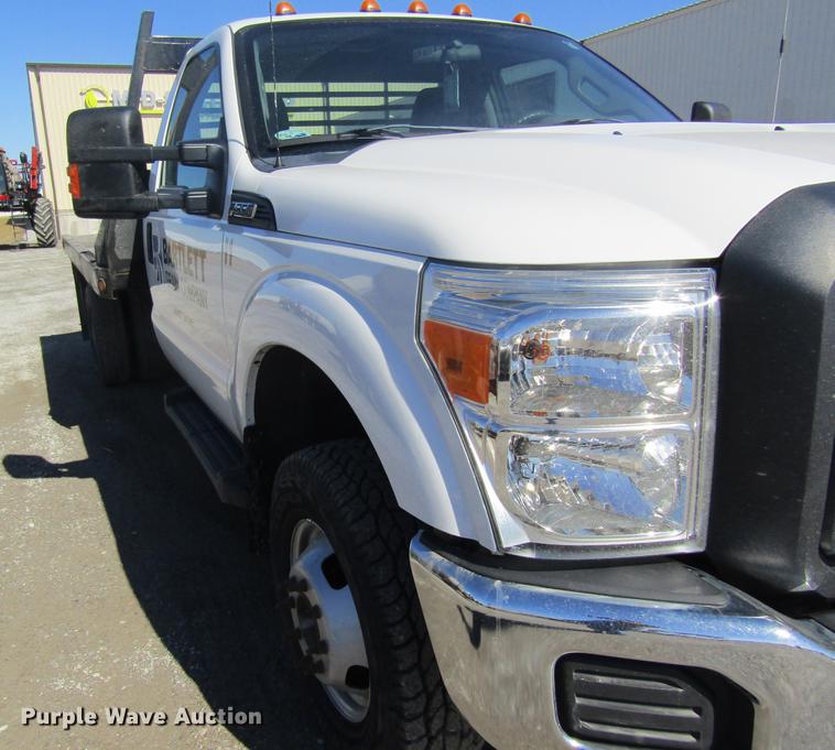 image for item DB5968 2013 Ford F350 Super Duty flatbed pickup truck