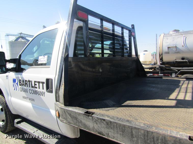 image for item DB5968 2013 Ford F350 Super Duty flatbed pickup truck