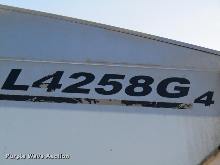 image for item DC4484 2013 Ag-Chem RoGator RG1100 self-propelled dry spreader applicator