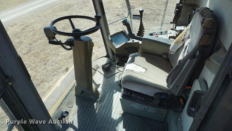 image for item DE3090 2003 Caterpillar Lexion 465 RWA combine
