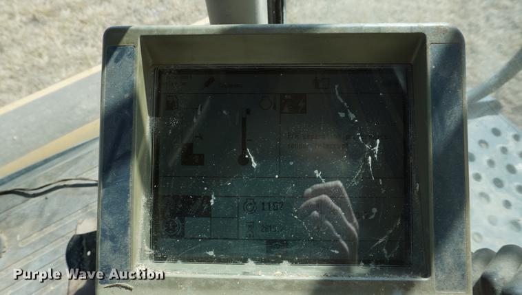 image for item DE3090 2003 Caterpillar Lexion 465 RWA combine