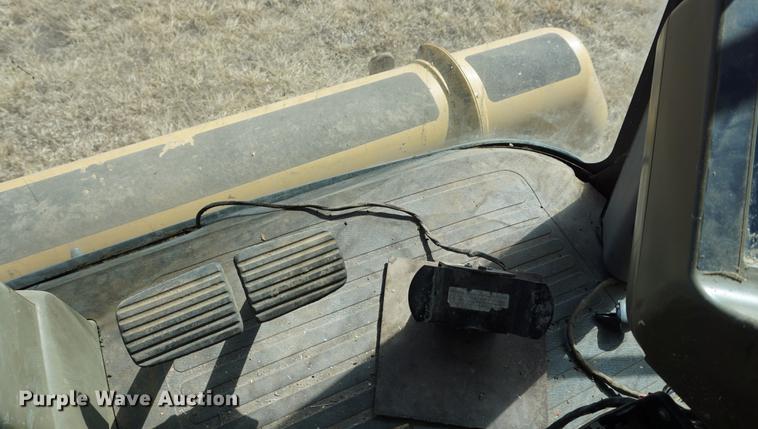 image for item DE3090 2003 Caterpillar Lexion 465 RWA combine