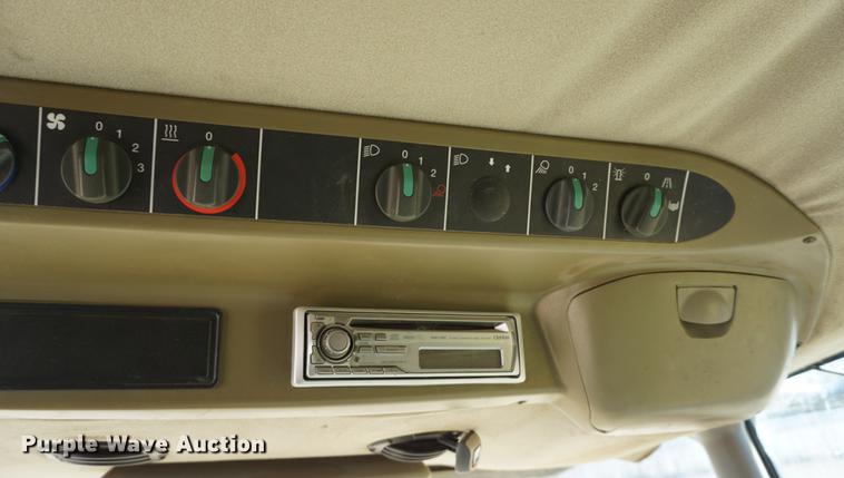 image for item DE3090 2003 Caterpillar Lexion 465 RWA combine