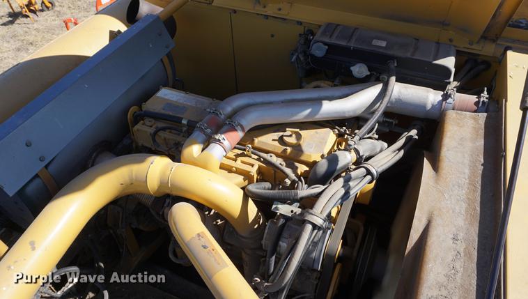 image for item DE3090 2003 Caterpillar Lexion 465 RWA combine
