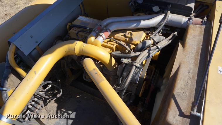 image for item DE3090 2003 Caterpillar Lexion 465 RWA combine