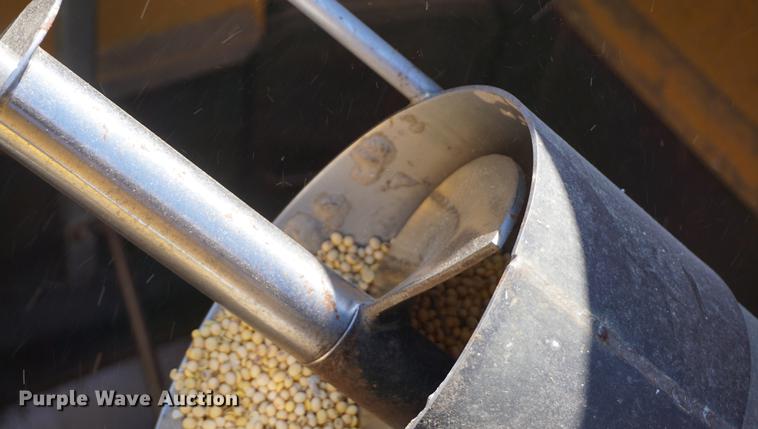 image for item DE3090 2003 Caterpillar Lexion 465 RWA combine