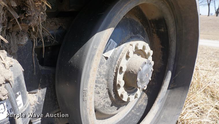 image for item DE3090 2003 Caterpillar Lexion 465 RWA combine