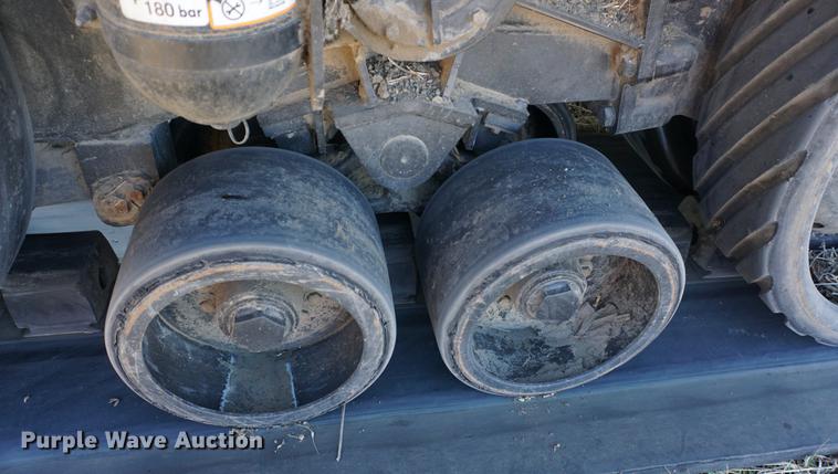 image for item DE3090 2003 Caterpillar Lexion 465 RWA combine