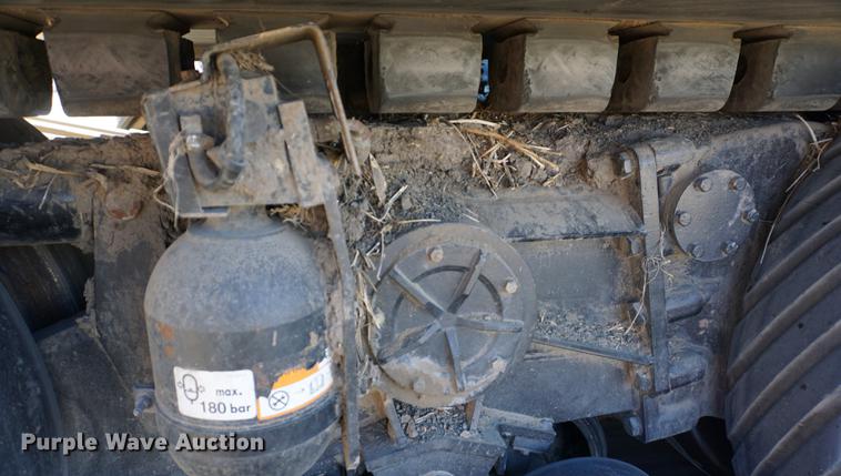 image for item DE3090 2003 Caterpillar Lexion 465 RWA combine