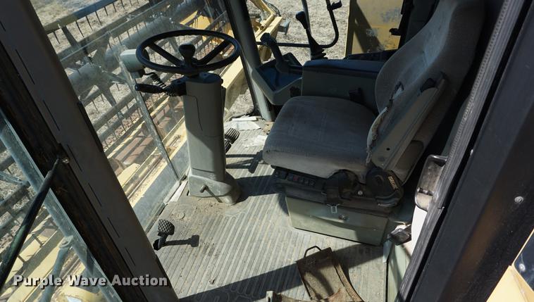 image for item DE3091 1998 Caterpillar Lexion 465 RWA combine