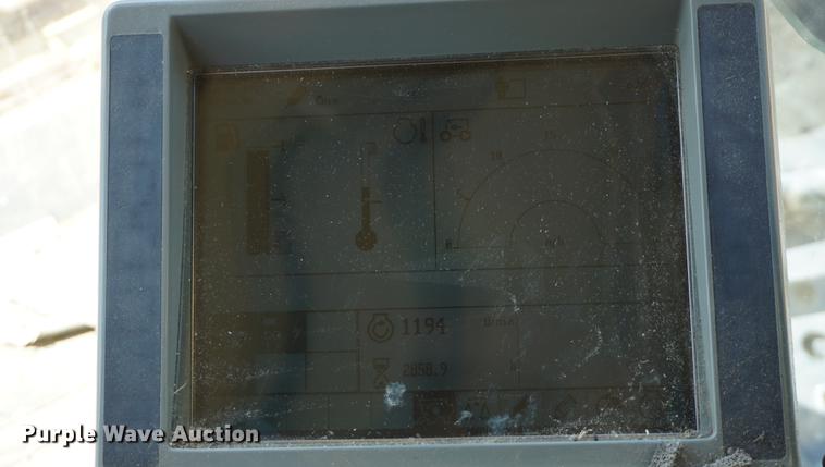 image for item DE3091 1998 Caterpillar Lexion 465 RWA combine