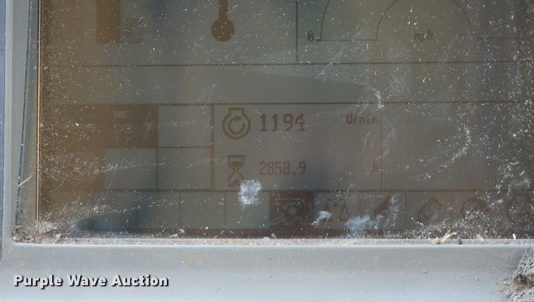 image for item DE3091 1998 Caterpillar Lexion 465 RWA combine