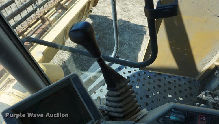 image for item DE3091 1998 Caterpillar Lexion 465 RWA combine