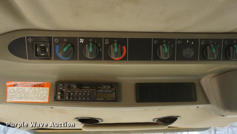 image for item DE3091 1998 Caterpillar Lexion 465 RWA combine