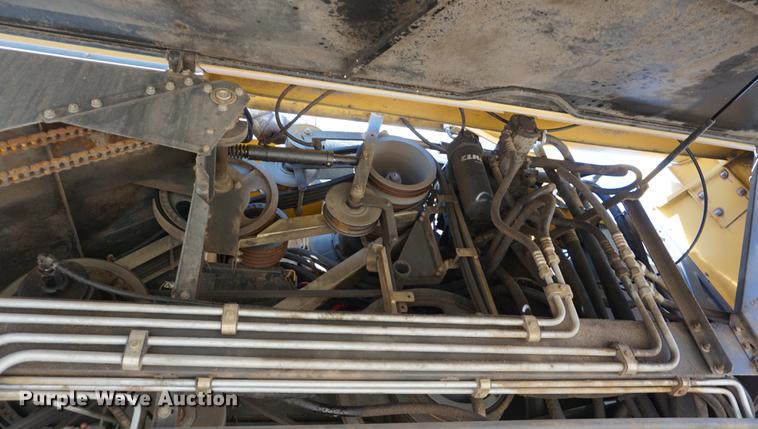 image for item DE3091 1998 Caterpillar Lexion 465 RWA combine