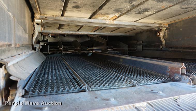 image for item DE3091 1998 Caterpillar Lexion 465 RWA combine