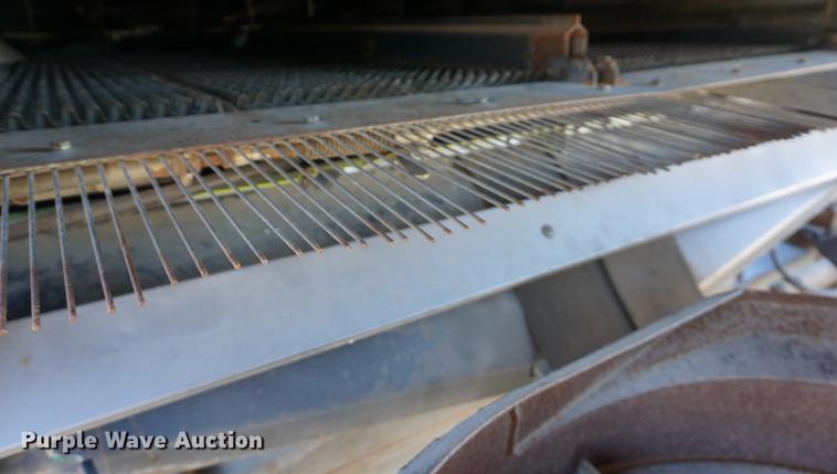 image for item DE3091 1998 Caterpillar Lexion 465 RWA combine