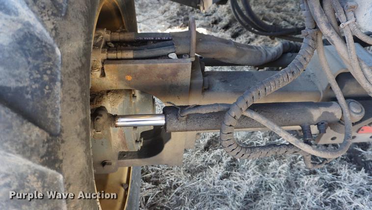 image for item DE3091 1998 Caterpillar Lexion 465 RWA combine