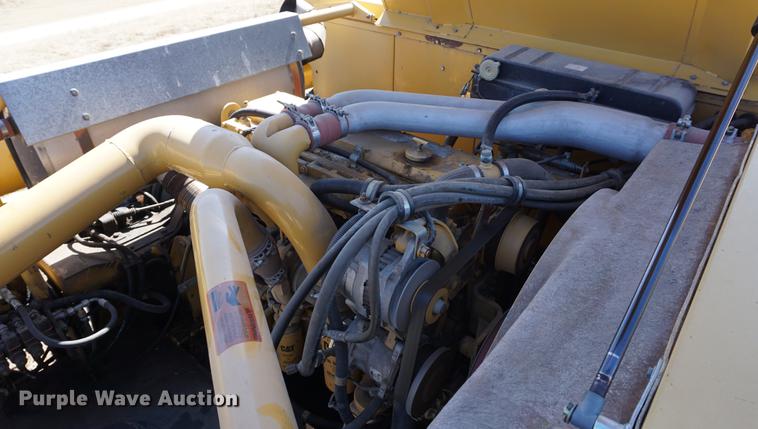 image for item DE3091 1998 Caterpillar Lexion 465 RWA combine