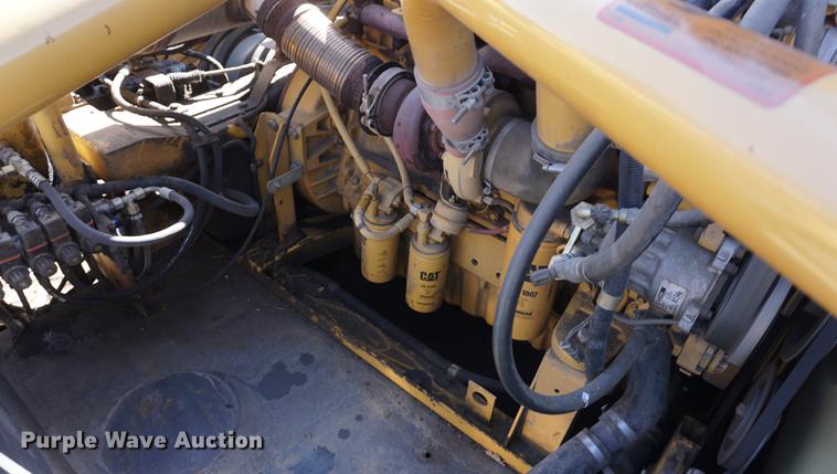 image for item DE3091 1998 Caterpillar Lexion 465 RWA combine