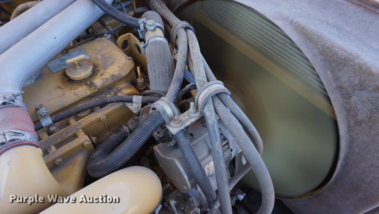 image for item DE3091 1998 Caterpillar Lexion 465 RWA combine