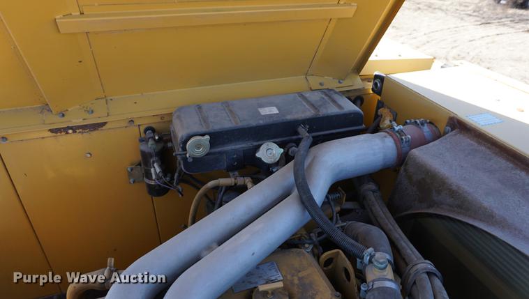 image for item DE3091 1998 Caterpillar Lexion 465 RWA combine